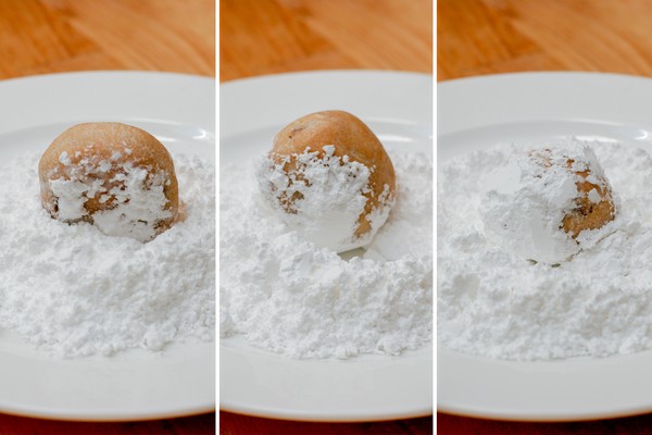 A triptych of a biscuit being rolled in confectioner's sugar on a white plate, where each panel shows the biscuit covered in more sugar